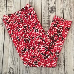 bebe Red Pink Black and White Floral Capri. Size Medium. EUC